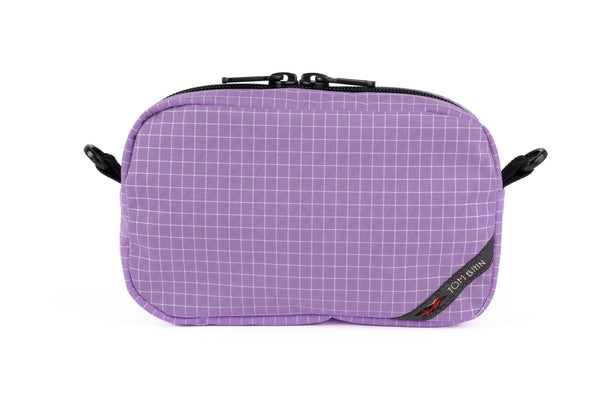 An all-fabric Wisteria (pale purple with white grid) 3D Organizer Cube.